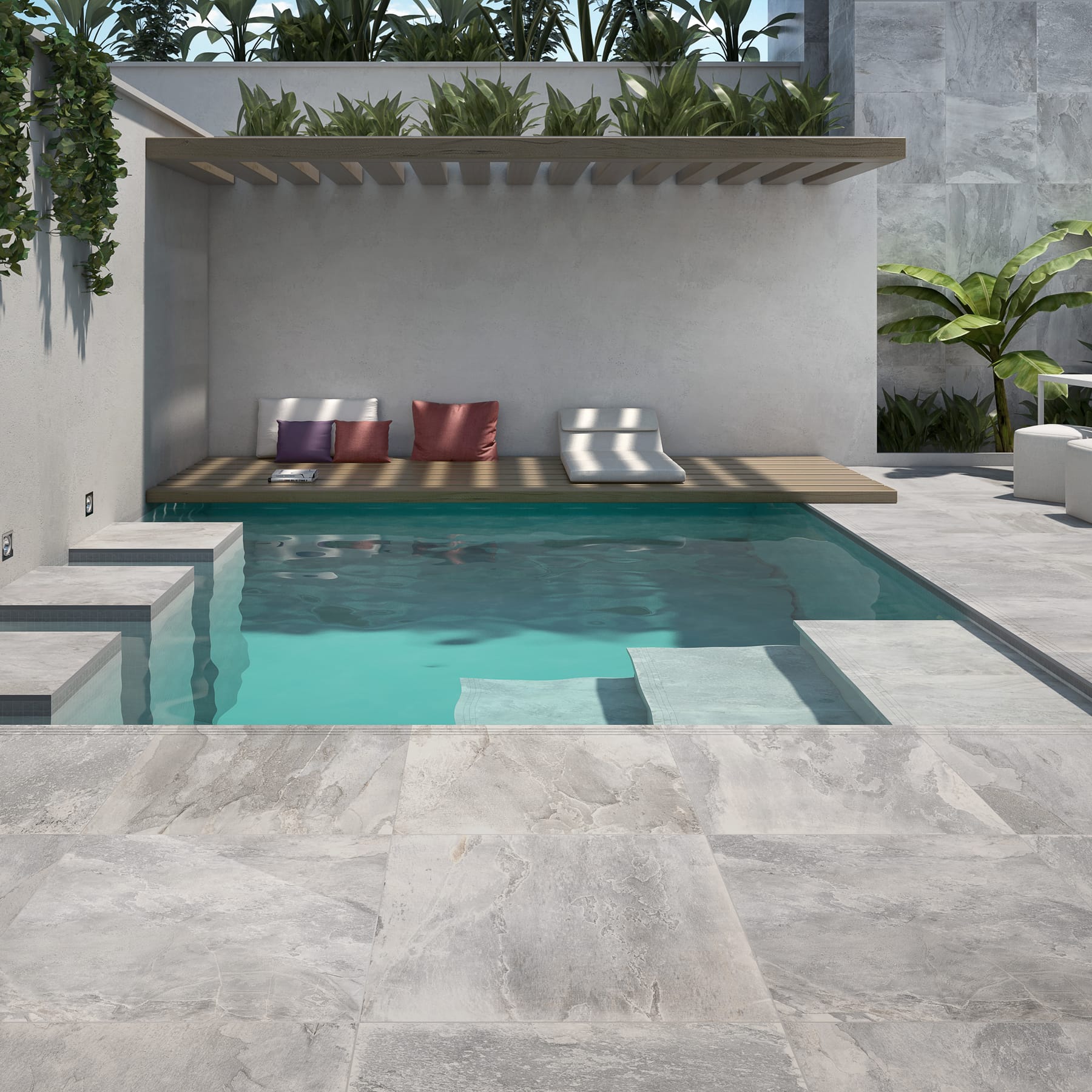 Piscina con pérgola y pavimento porcelánico de exterior efecto piedra gris