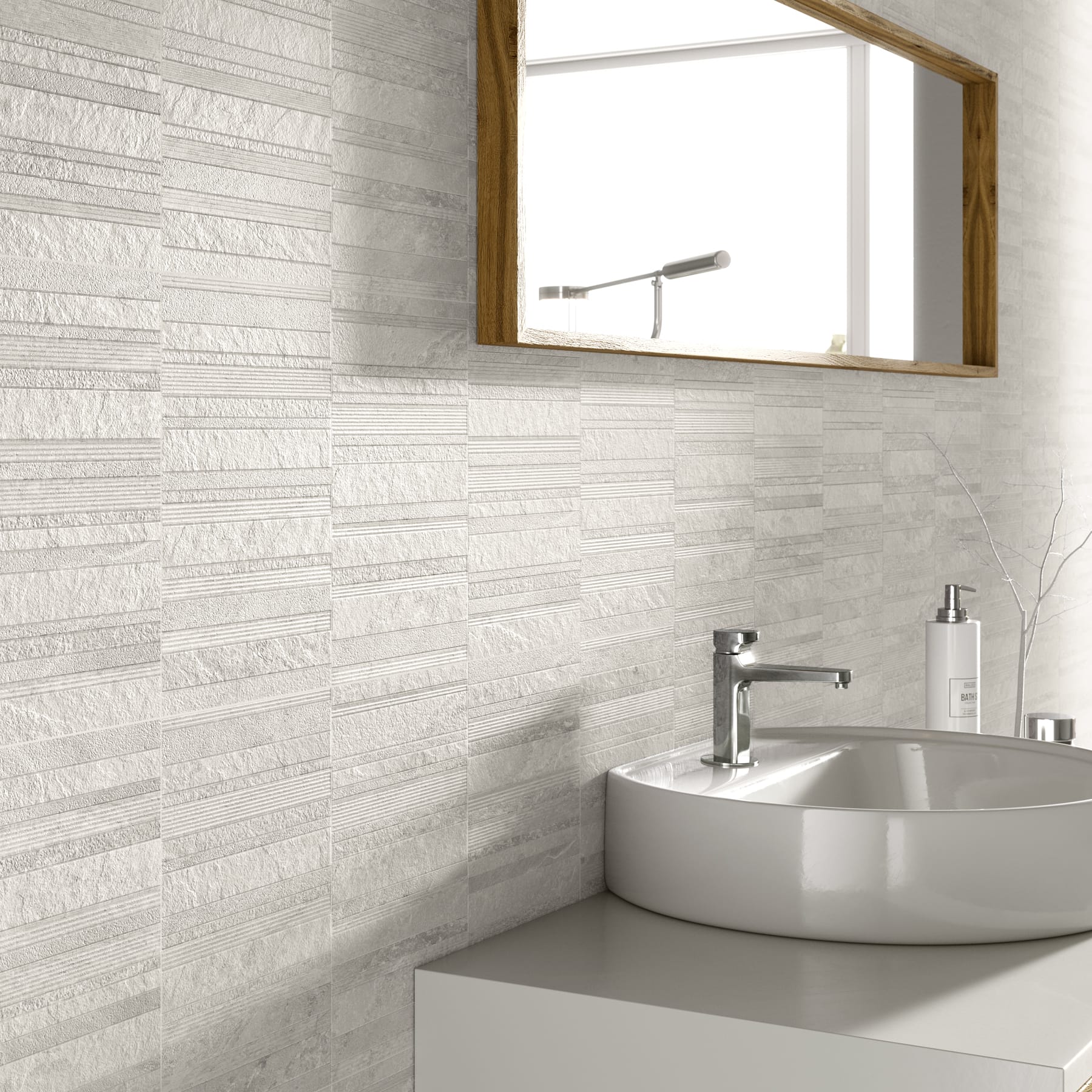 Lavabo blanco sobre pared de azulejo en relieve de tono hueso